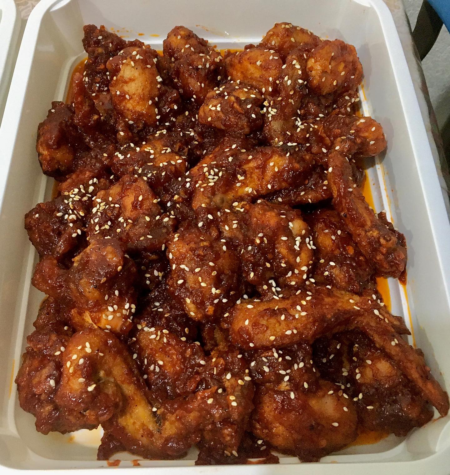 Chicken Buffalo Wings - Crispy chicken wings glazed with spicy Korean-style buffalo sauce